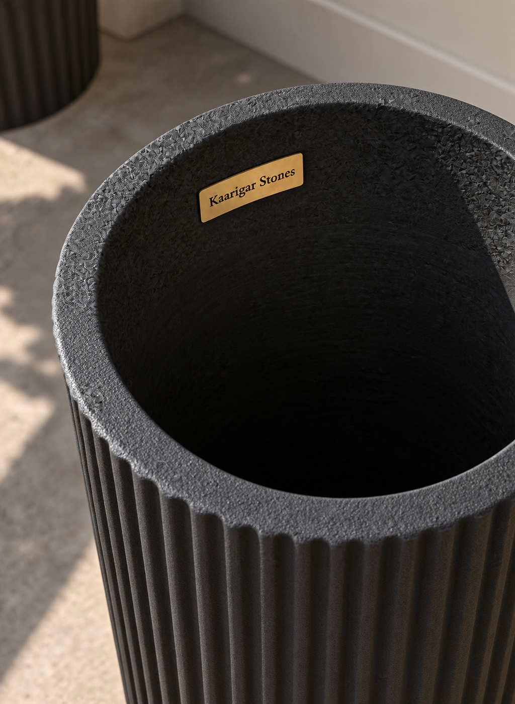 Ribbed planter branded detail