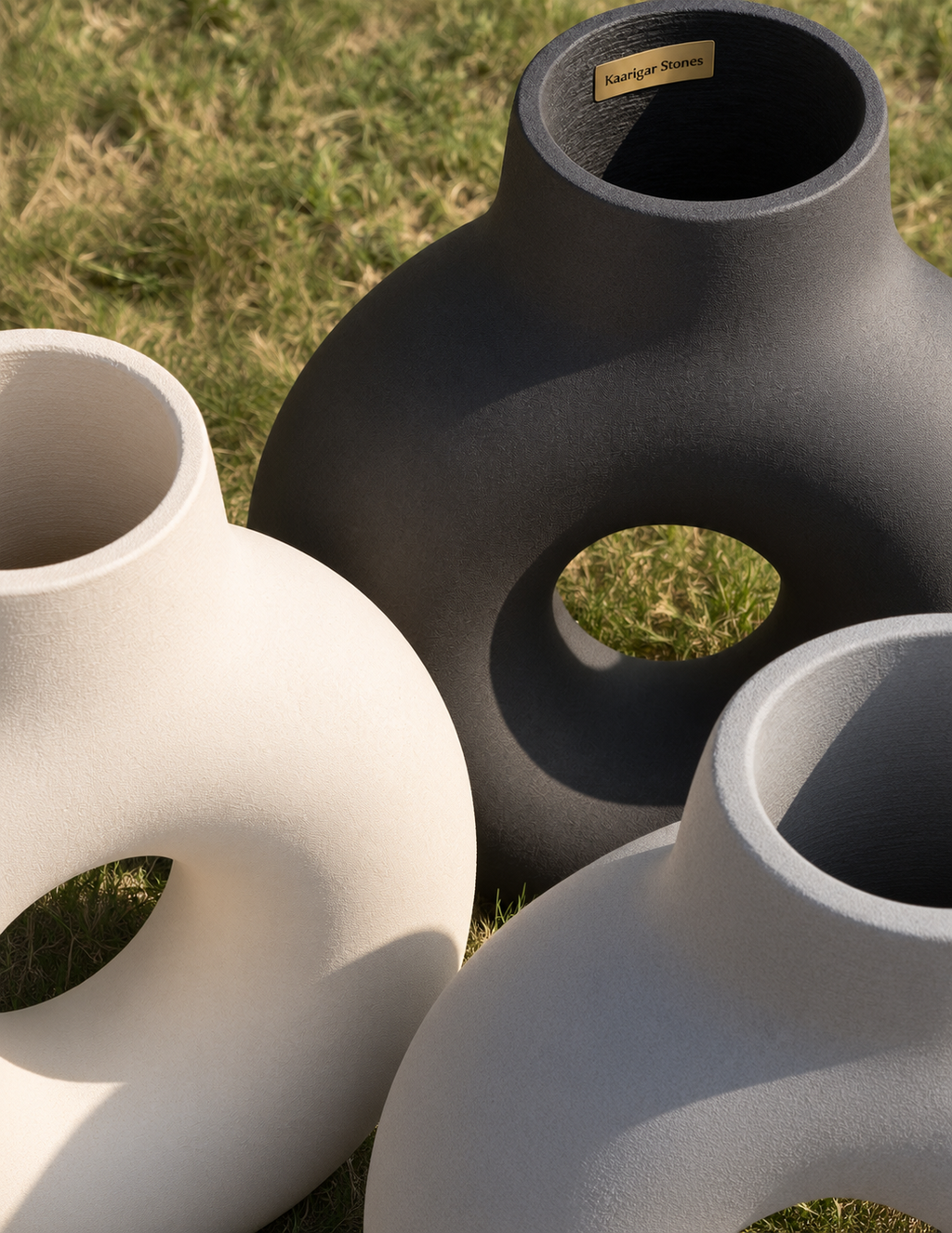 Sculptural loop vases outdoors
