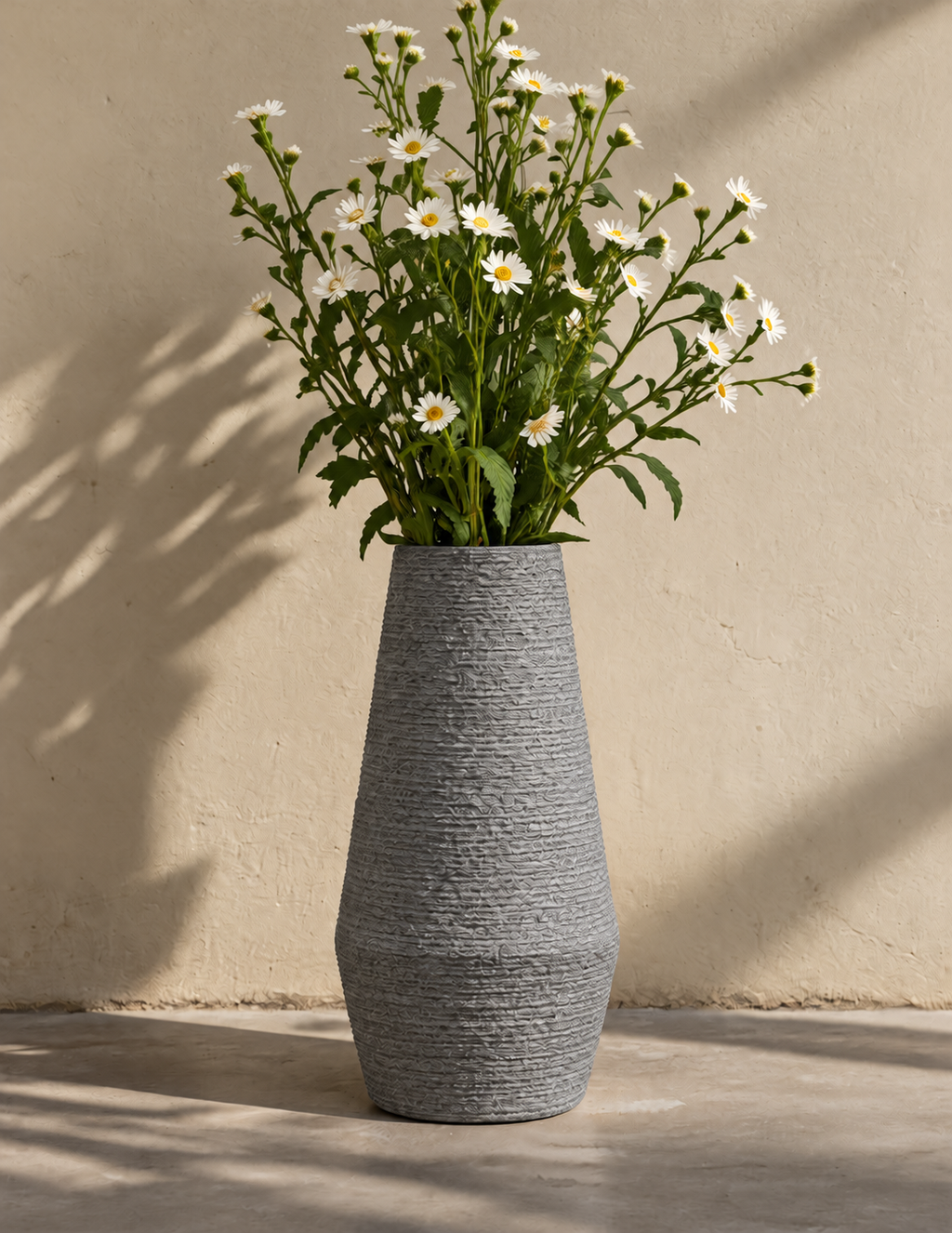 Textured vase with daisies
