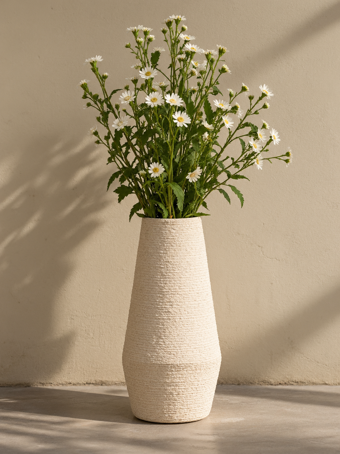 Textured vase with wildflowers
