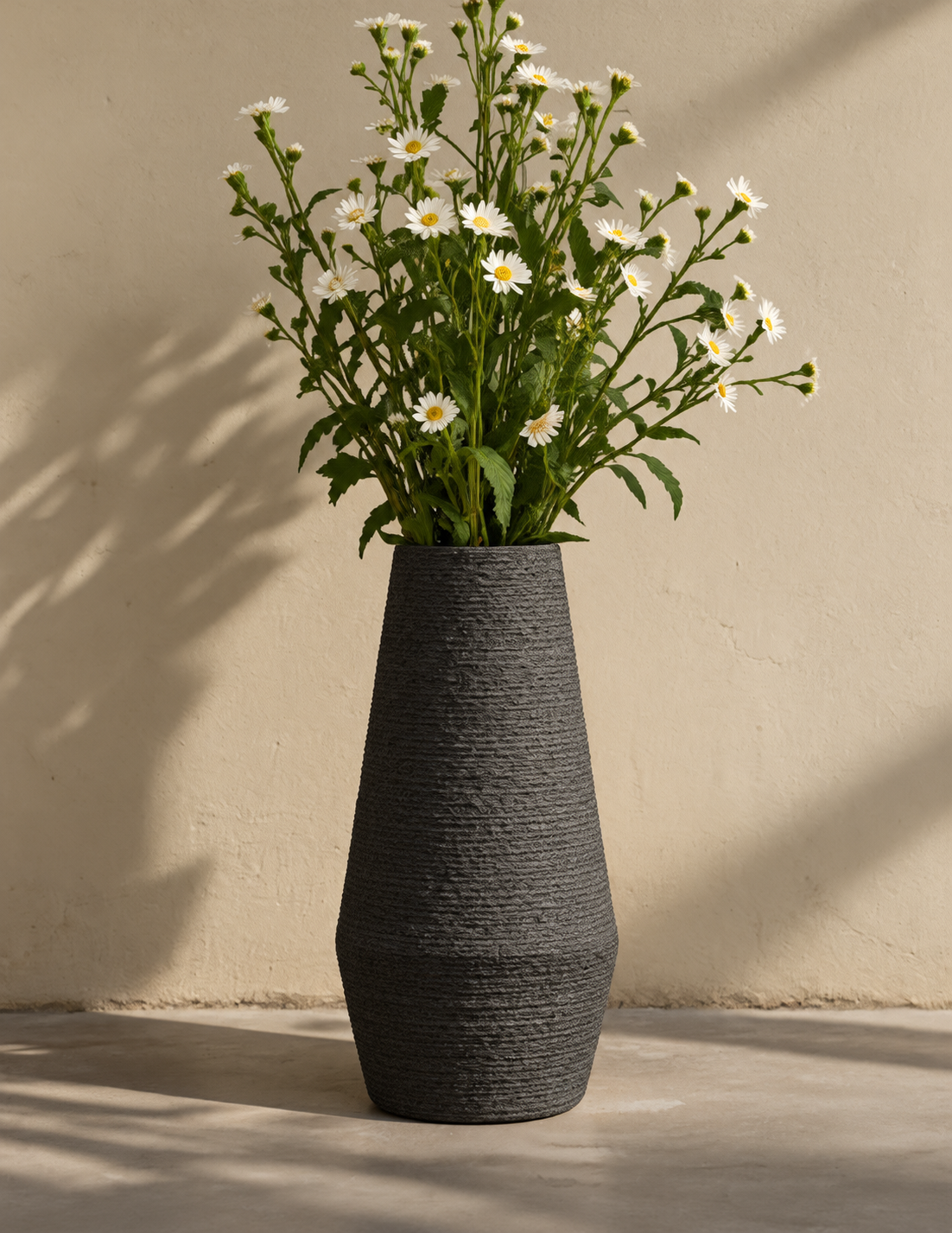 Charcoal vase with wildflowers